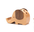 Wooden elephant pen holder in walnut and beech finish with pen slots on the back
