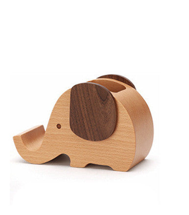 Side view of wooden elephant desk organizer with walnut ears and pen storage slots