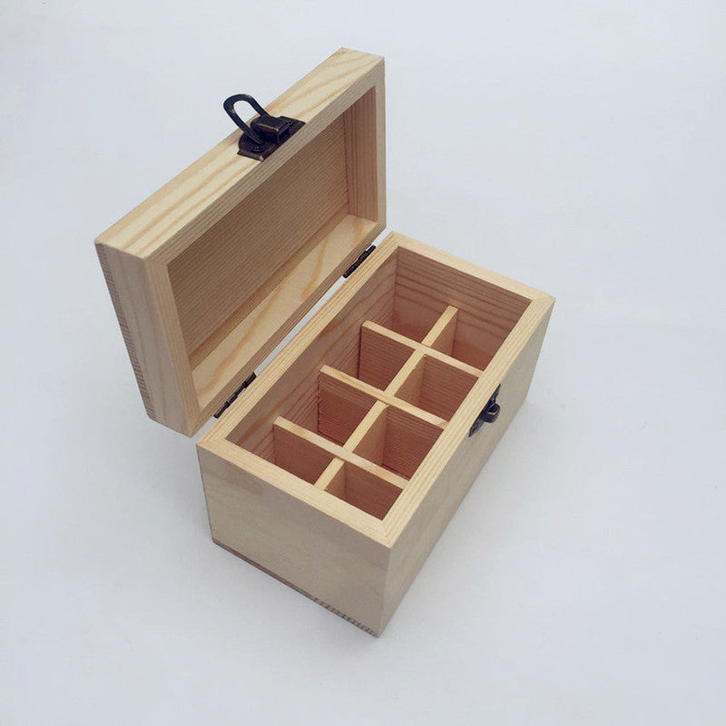Luxury handcrafted wooden essential oil storage box with hinged lid open, showing 8 compartments for organizing essential oils